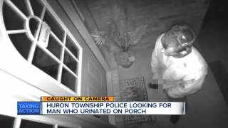 Man caught on camera urinating on front porch