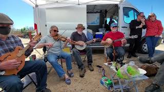 Dan caught with a banjo at the Southwest Old-Time Stringband Gathering 2023