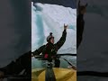 kayaker descends ice waterfall in arctic circle