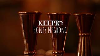 Celebrate 100 years of the Negroni with a honey twist on this cult classic cocktail