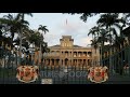 the front gates of iolani palace in honolulu, the only royal palace in the united states