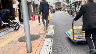 Man Walks with Ippon Geta