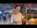 hack for how to pay local prices at street markets in thailand