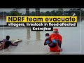 ndrf team evacuate villagers livestock in flood affected kokrajhar