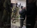 palestinian woman scolds israeli soldiers raiding her home as she smokes shisha