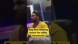 Sidhu Mossewala Music director byg byrd making music in his home studio .
