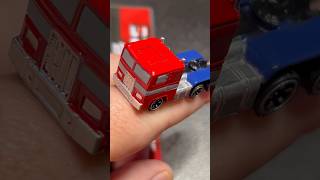 Cool little robot. #optimusprime #robotsindisguise #mini #toys I love Micheal bay .