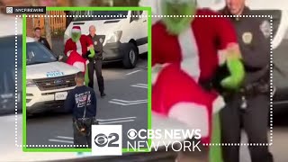 NYPD officers stop the Grinch from stealing Christmas gifts for FDNY party