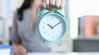 Woman showing time on clock stock footage #copyrightfree #stockvideo #free