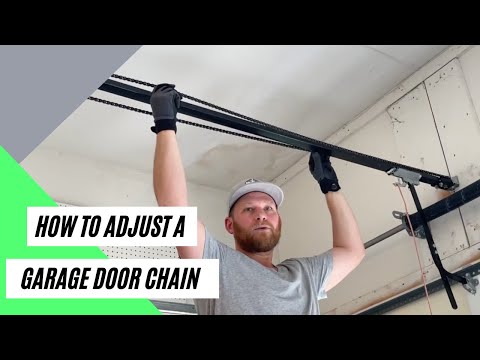 How much tension should be on a garage door chain?