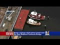 barge capsizes while being towed off new bedford