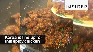 Koreans line up in the street to taste this spicy fried chicken