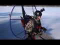 trike paramotor flying off the winter ice