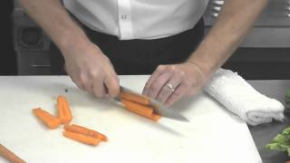 Cleaning, slicing, chopping fresh carrots -- Peter Robertson, RPs Pasta, Lubing Creative