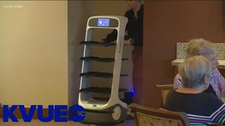 Independent living community is turning to robots to fill staffing needs | KVUE