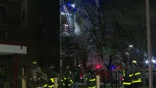 Firefighters rescue dozens after Detroit apartment catches fire