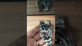 Clean factory/genuine Rolex submariner bezel action comparison