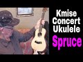 Kmise solid spruce top concert ukulele bundle.  Guitar headstock.