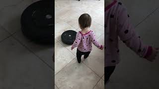 Roomba IRobot from Costco in Manhattan Exploring the Kitchen and Chasing our Toddler. Mom saves her.