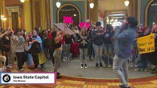 Students chant "We say gay" and "Trans rights are human rights" at Iowa State Capitol