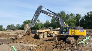 John Deere 470G LC Excavator Digging Sanitary Trench