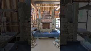 Hand dressed Granite lintel to bridge opening of this Rumford style stone fireplace.