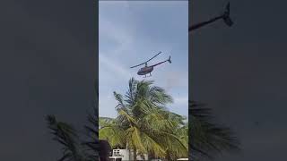 The helicopter dropped flowers on Pungudutivu Kannakai Amman - Kumpabisegam