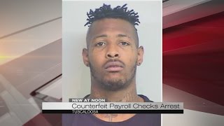 Counterfeit payroll checks arrest