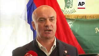 Serb soldiers react to the life imprisonment of Mladic