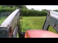 kubota m128x mowing with krone mower