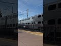 caltrain limited 513 passing by burlingame station