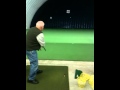 John Uline practicing his golf swing