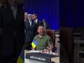 zelensky laughs at the collapse of putin s military while at the nato summit