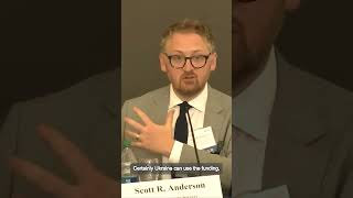 Scott R. Anderson speaks at the 2023 National Security Symposium