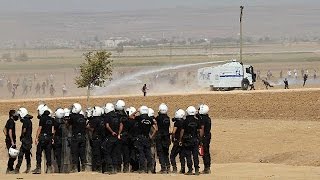 Clashes on the Turkish border as Kurds flock to assist their brethren in Syria