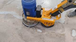 Dfg280 110v floor grinder with fast fix shoes and dust control on paint removal concrete floor.