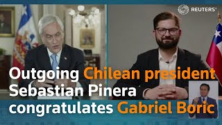 Outgoing Chilean president Sebastian Pinera congratulates Gabriel Boric