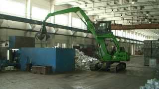 SENNEBOGEN - Material Handling: 821 Crawler Electro machine with orange peel grab, Germany