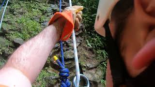 Rappelling from 50 Meters on a clift in the Costa Rica Jungle down the watwrfall