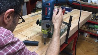 Drilling the bench dog holes with Proxxon BFB 2000 drill stand and Bosch GSB 21-2 RCT hand drill