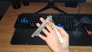 torsion on the finger of the balisong (butterfly knife)