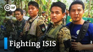 Philippines army and Muslim rebels join forces against ISIS | DW News