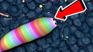 Fat Rainbow Snake VS Tiny Snakes - 100k Mass (SLITHERIO)