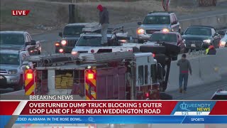 Dump truck overturns on I-485, causes heavy delays