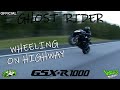 GSXR 1000 WHEELING ON HIGHWAY + COPS CLOSE GHOSTRIDER