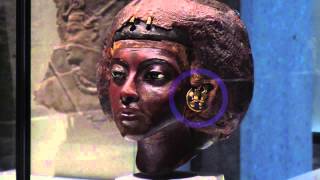 Portrait head of Queen Tiye with a crown of two feathers