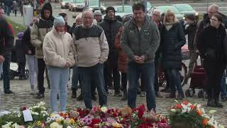 Germans mourn the 5 killed and 200 injured in the apparent attack on a Christmas market