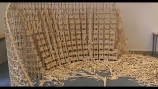 Man spends days building intricate structures from thousands of tiny planks only to knock them