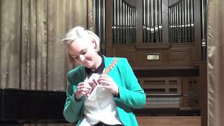 Borbála Seres plays on a box guitar for kids