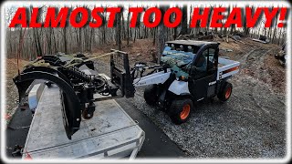 Unloading 2 Henke Snow Plows With Our Bobcat Toolcat 5600!